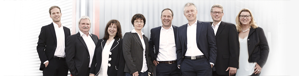 Gruppenfoto von acht Mitarbeitenden der Langewiesche Fleischwaren GmbH, stellvertretend für das Team